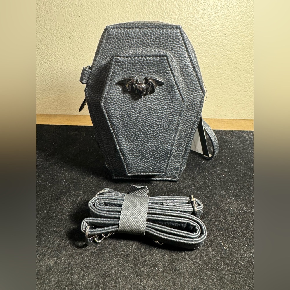 Crossbody mini coffin bat clutch new with tags